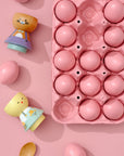 Kokeshi dolls and pink eggs in a carton on a pink background.