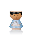 Kokeshi doll with a blue dress featuring a cloud and character design, black hair, and a smiling face.