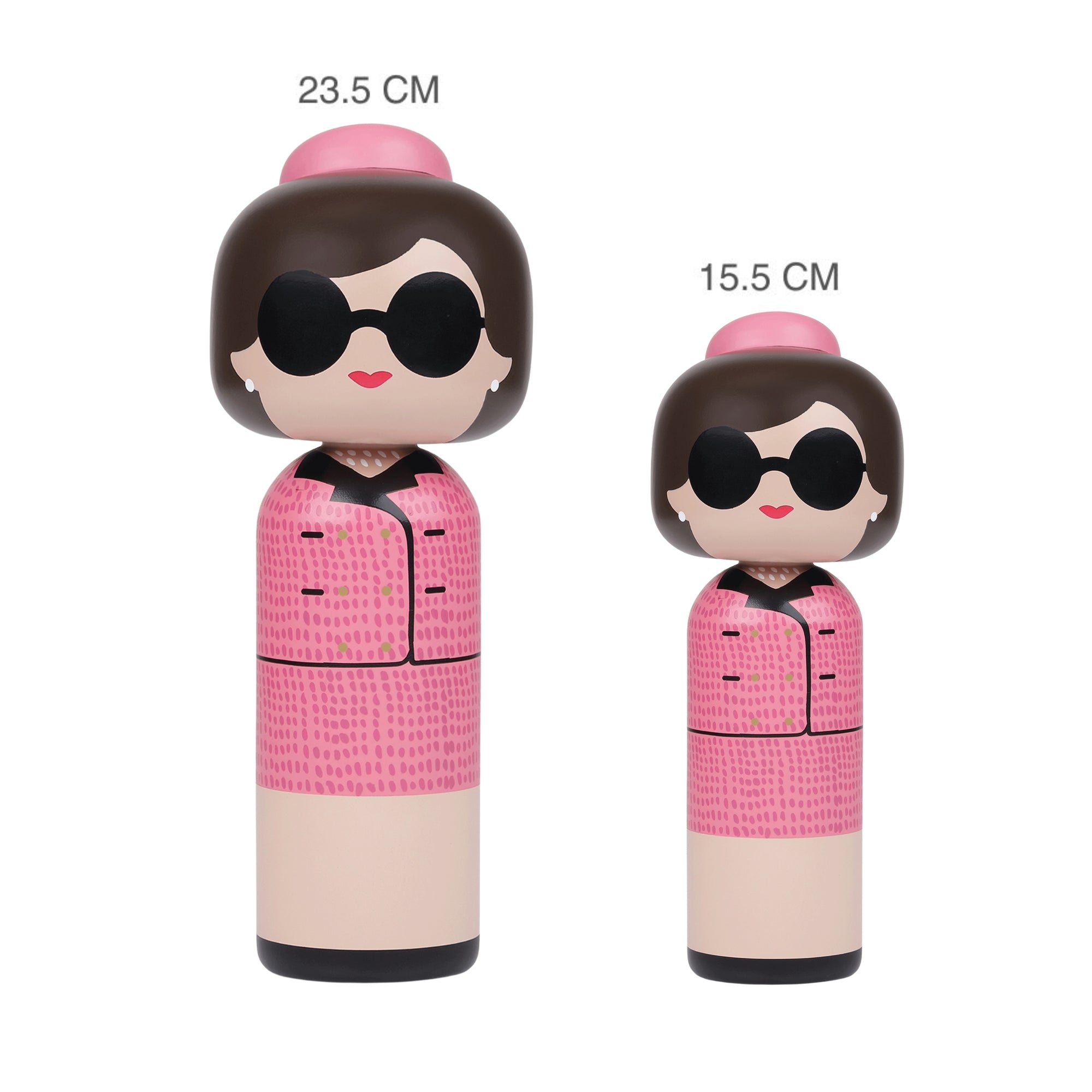 Two kokeshi dolls in pink outfits and sunglasses, one 23.5 cm and the other 15.5 cm tall.