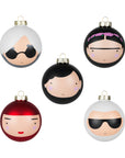 Five decorative baubles with stylized faces, each featuring unique hairstyles and accessories.