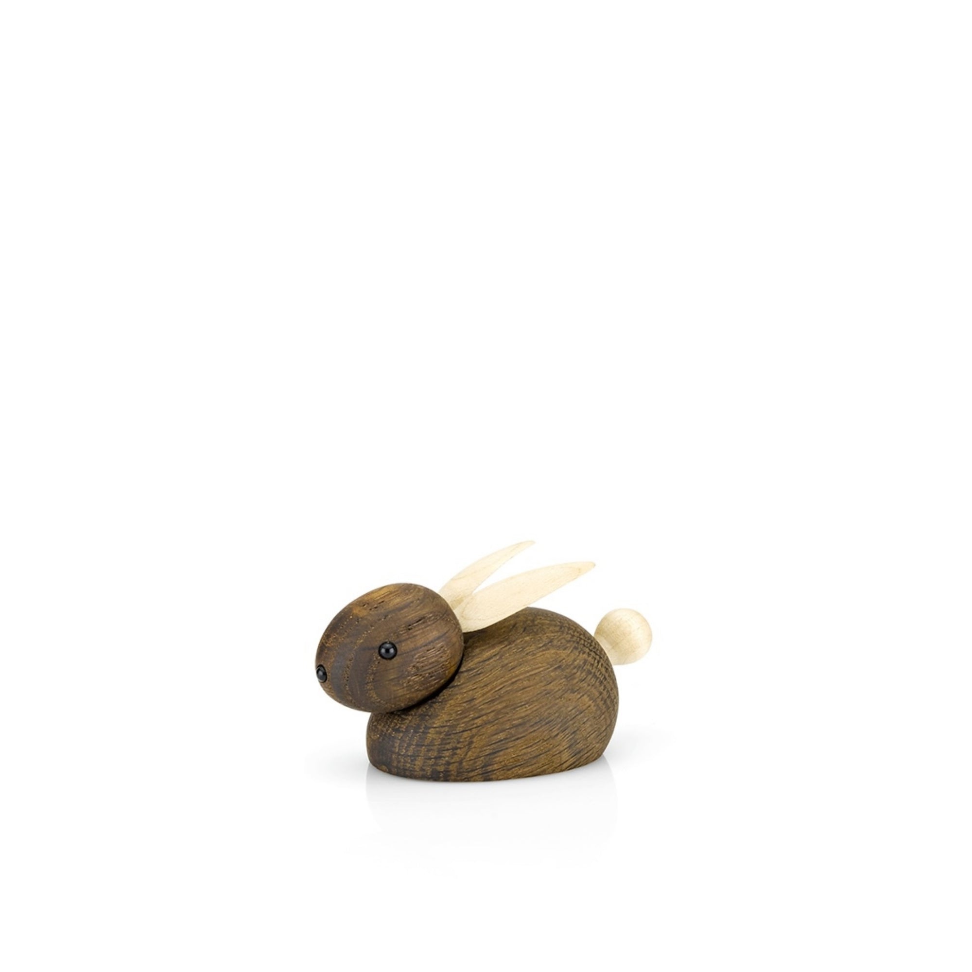 Petite figurine de lapin en bois avec des oreilles et une queue de couleur claire.