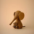 Lucie Kaas wooden elephant kokeshi doll with long trunk and round ears, oak finish decorative toy