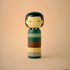 Lucie Kaas kokeshi doll with green striped sweater and cap, minimalist wooden interior figure