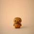 Lucie Kaas small wooden duck kokeshi doll with round head and black eyes