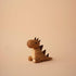 Lucie Kaas wooden dinosaur toy, handcrafted oak kokeshi-style figure with dark spike details