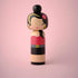 Lucie Kaas wooden kokeshi doll with beehive hair, red polka-dot dress and rose hairpin, retro singer style