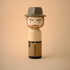 Lucie Kaas wooden kokeshi doll dressed as a vintage sheriff with hat and badge, neutral beige tones