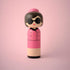 Lucie Kaas kokeshi doll in pink suit with black sunglasses, 1960s film‑star inspired interior decor