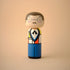 Lucie Kaas wooden kokeshi doll: retro gentleman with glasses, small mustache and colorful geometric outfit