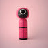Lucie Kaas pink kokeshi doll inspired by Squid Game guard with circle mask, wooden toy