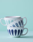 Lotus Tea Cup And Saucer | White, Grey TEA CUP AND SAUCER - Lucie Kaas